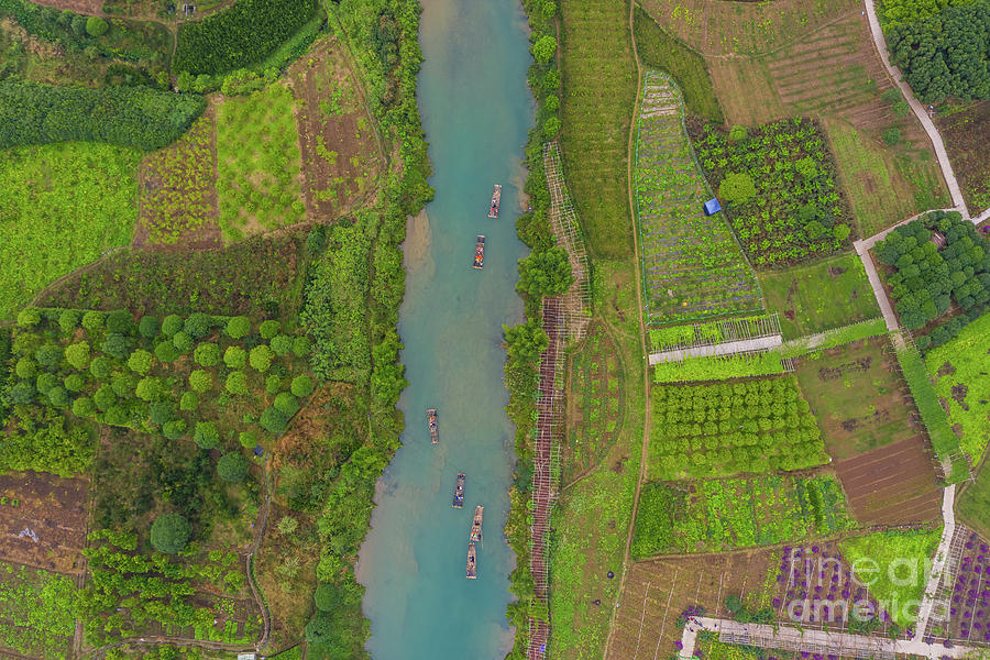 Over China Rafts on the Li River Photograph by Mike Reid