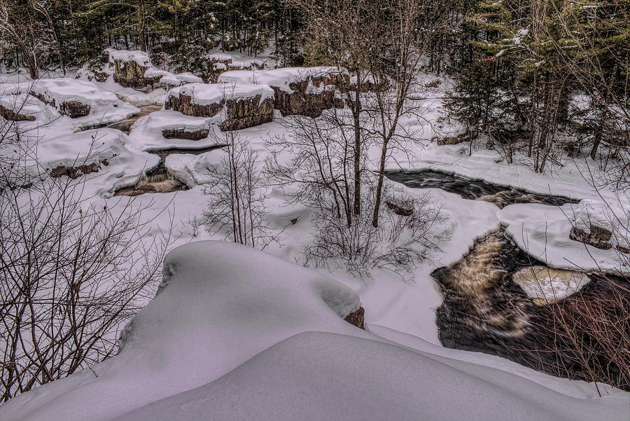 Over The Snowy Ledge At Eau Claire Dells Photograph by Dale Kauzlaric