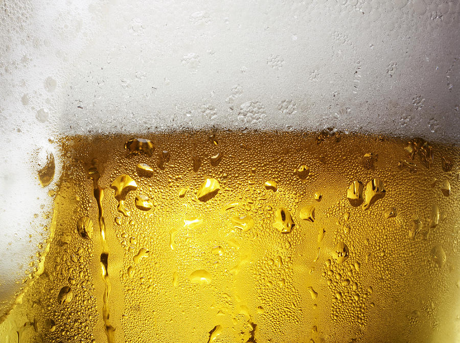 Overfull Glass of Beer with Condensation Photograph by Jack Andersen