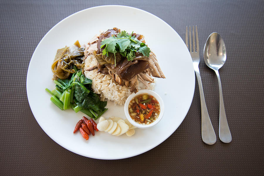 Overhead view of Rice With Roasted Pork Gravy On Plate Photograph by Naphakm