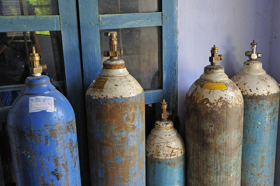 Oxygen tanks at arural hospital, Vietnam Photograph by Sami Sarkis
