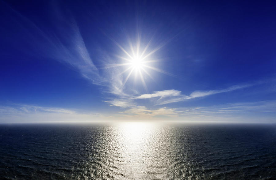 Pacific Ocean And Sun Photograph