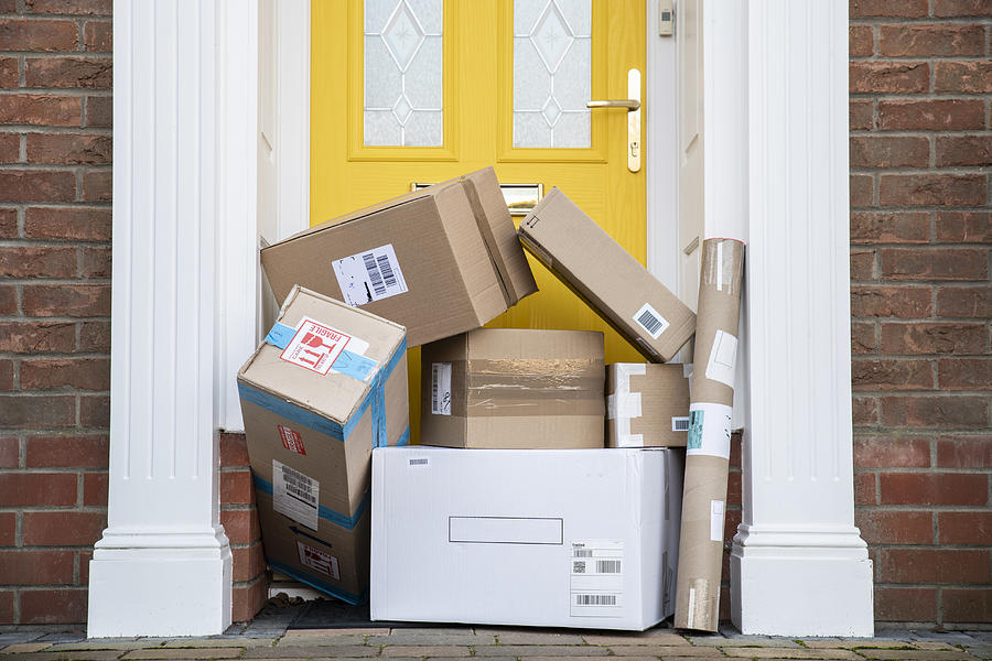 Packages Delivered to House Photograph by Jacobs Stock Photography