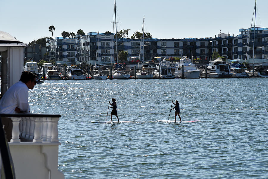 Paddle boarding in the harbor fine art seascape Photograph by Mark Stout