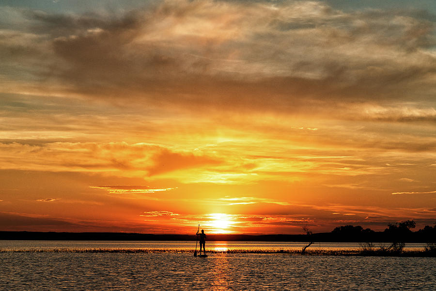 Paddleboarder Enjoys A Gorgeous Sunset Photograph