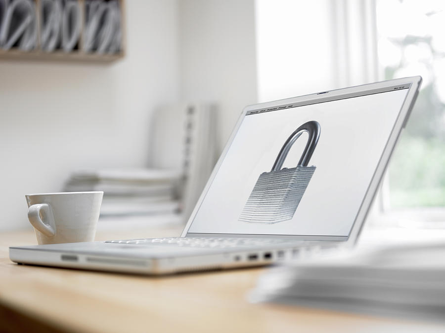 Padlock picture on laptop screen Photograph by Adam Gault