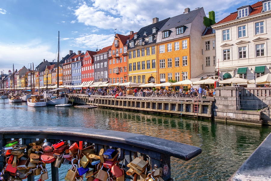 Padlocks and colorful buildings of Nyhavn in Copenhagen, Denmark Photograph by Elenarts - Elena Duvernay photo