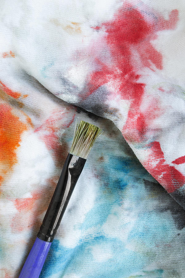 Paint brush on cloth Photograph by Tarzhanova