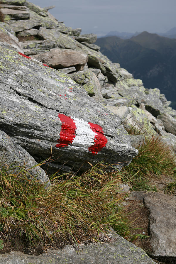 painted trail marker high in the Austrian Alps. Photograph by Raclro