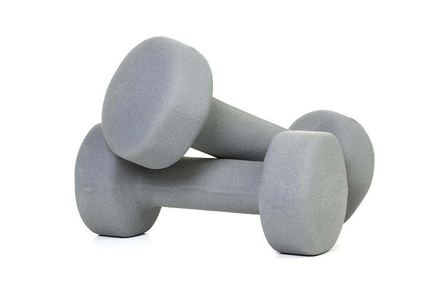 Pair of grey dumbbells isolated Photograph by Eyewave