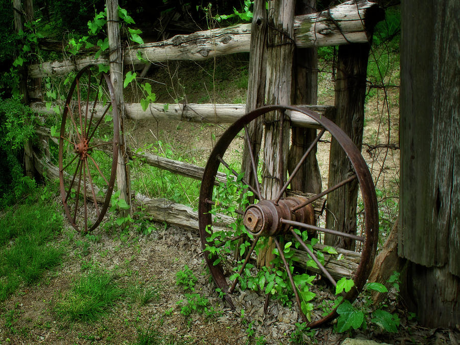 Pair of Rusty Wagon Wheels Photograph by David and Carol Kelly