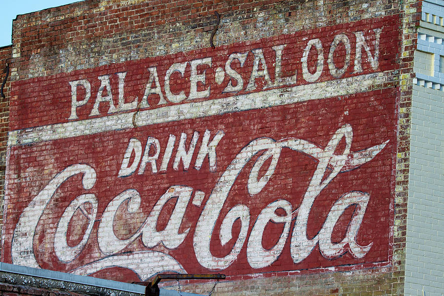 Palace Saloon ad with Coca Cola Photograph by Karen Foley