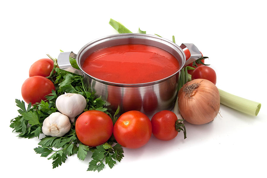 Pan of homemade tomato sauce with vegetables Photograph by Vasiliki