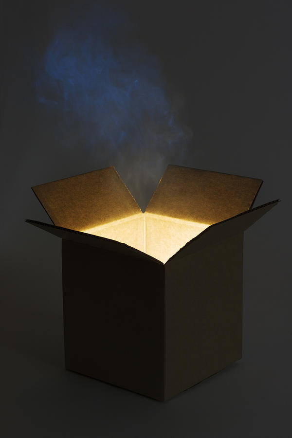 Pandora Box Open with Mysterious Glowing Magic Gift Photograph by YinYang