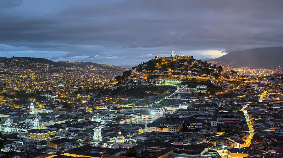 Panecillo hill Virgen of Quito statue and colonial center at night Photograph by Henri Leduc