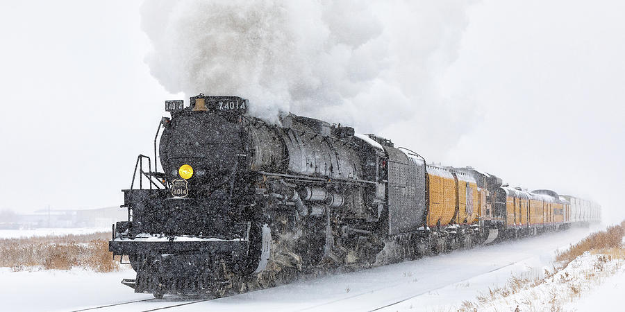 Panorama of a Steam Engine Racing Through a Snowstorm Photograph by Tony Hake