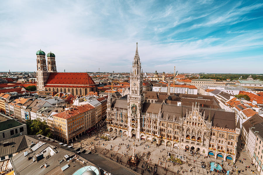Panorama of Marienplatz square with New Town Hall and Frauenkirche (Cathedral of Our Lady). Photograph by Nikada