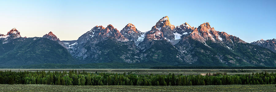 Panorama of Tetons with morning light hitting the peaks Photograph by Kelly VanDellen