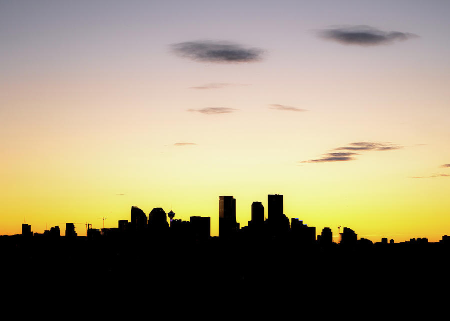Panoramic sunset cityscape from Calgary	 Photograph by Peter Kolejak