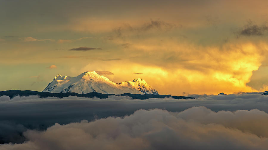 Panoramic view of Antisana volcano during sunset light on misty cloudy day Photograph by Henri Leduc