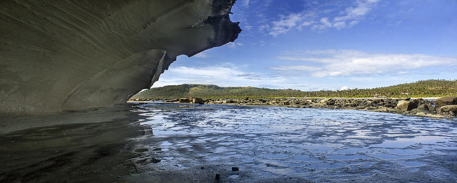 Panoramic view with enclosed rock cave on foreground Photograph by Chris Dela Cruz
