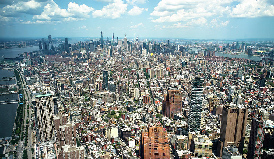Panoramic views of endless cluster of buildings in Manhattan. Photograph by Jean-Luc Farges