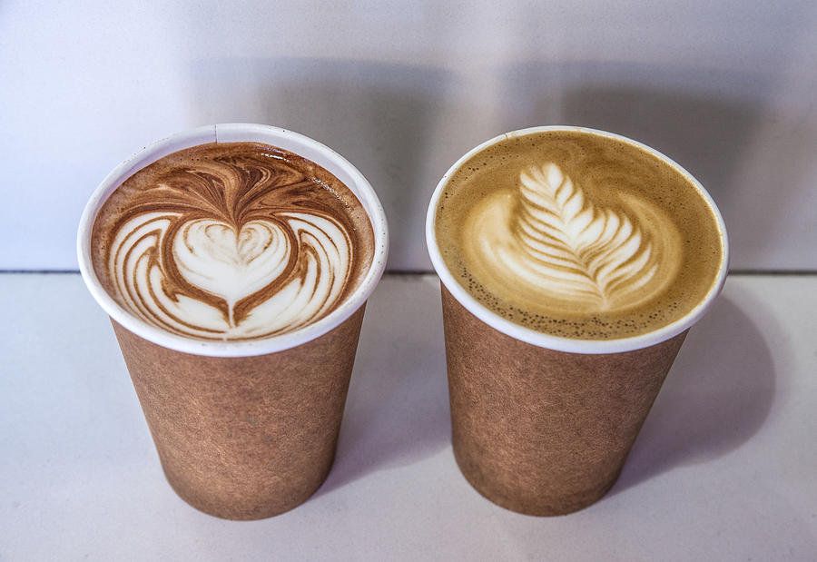 Paper cup with cocoa and latte coffee to go in front of a cafe in San Francisco Photograph by Christina Felschen