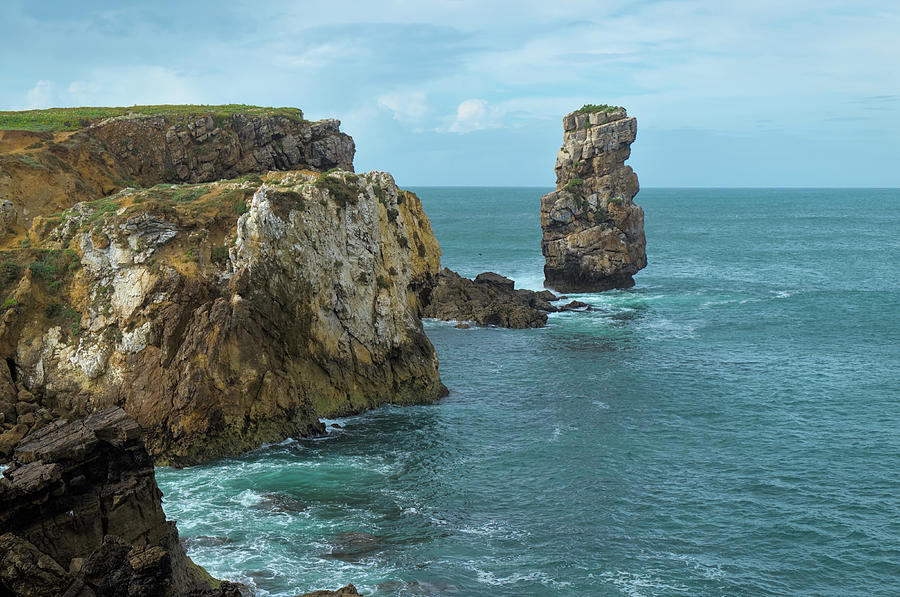 Papoa cliffs and sea in Peniche Photograph by Angelo DeVal