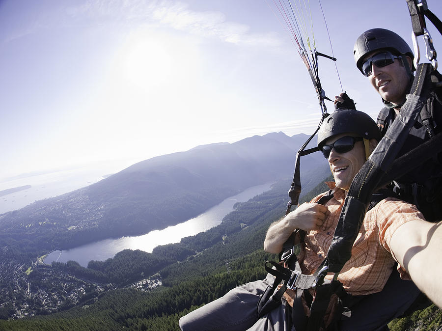 Paragliding Photograph by Darryl Leniuk