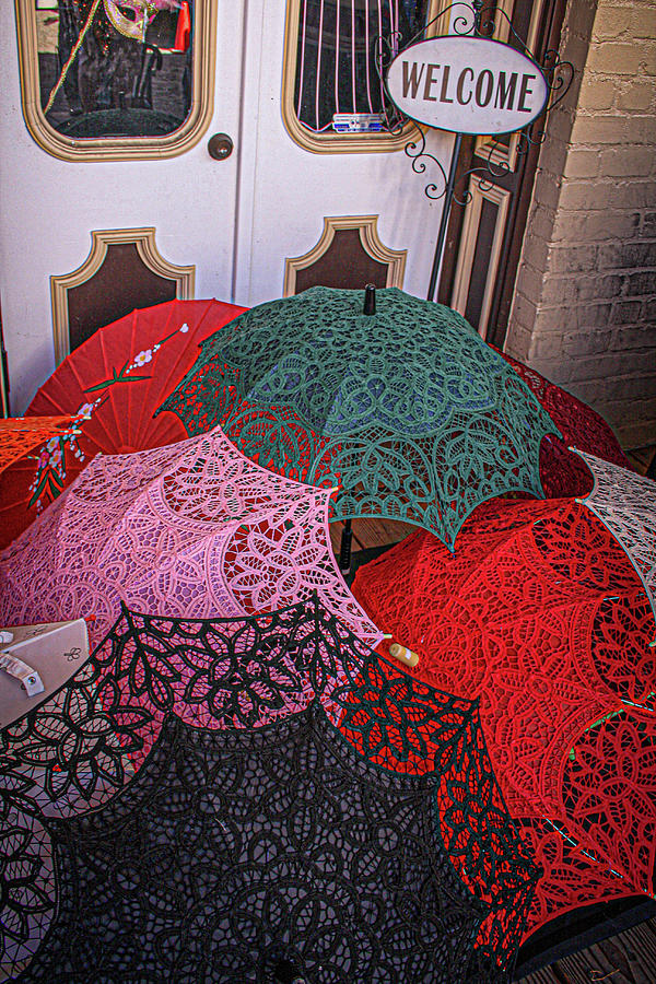 Parasols and the Hidden Mask Photograph by Sally Bauer