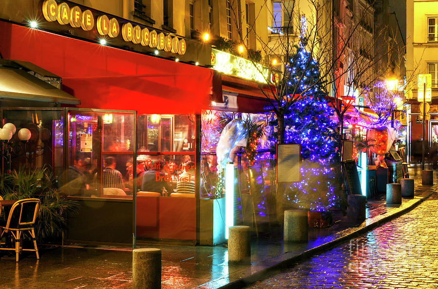 Paris Cafe La Bucherie at Night in France Photograph by John Rizzuto