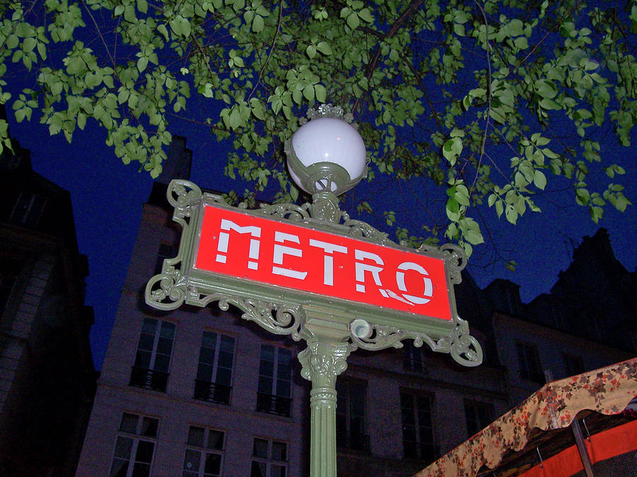 Paris Metro at Night Photograph by Matthew Bamberg