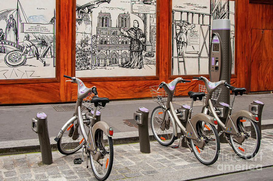 Paris Rental Bicycles Photograph by Bob Phillips