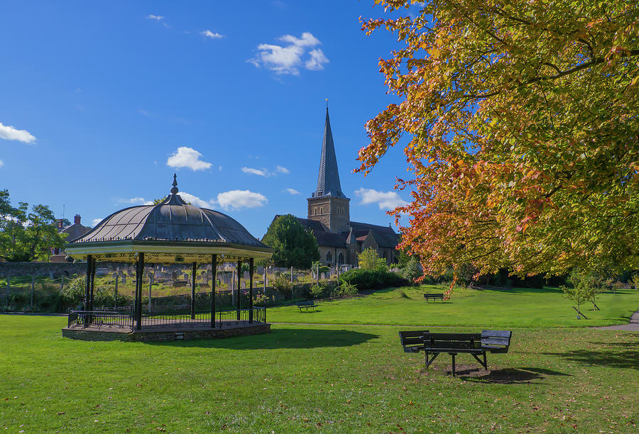 Fall Photograph - Parish Church of St. Peter and St. Paul, and Bandstand ,Godalmin by Philip Enticknap