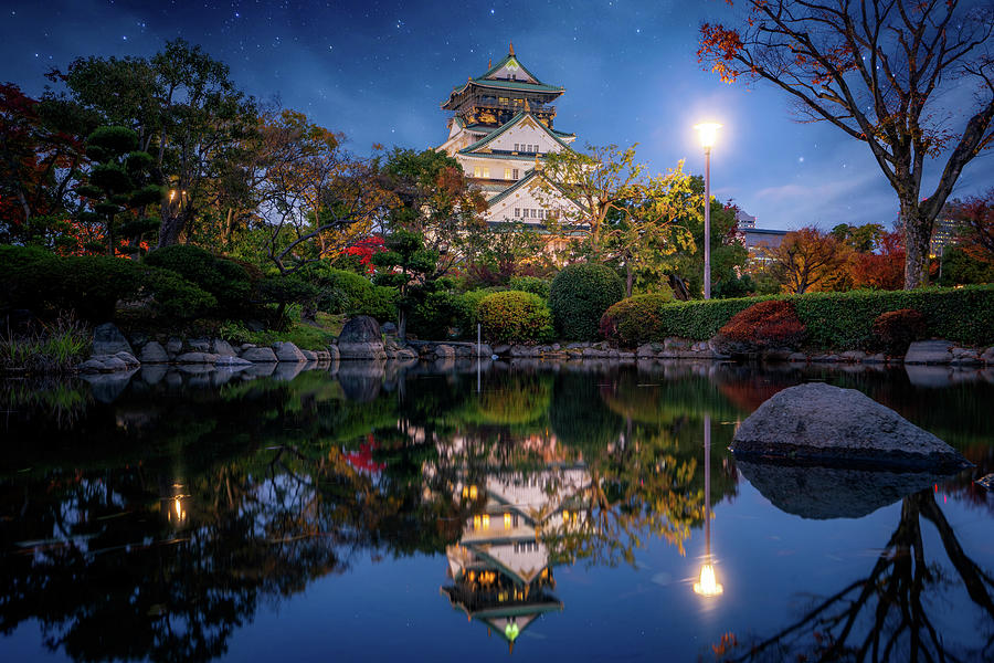 Park in Osaka castle on night time Photograph by Anek Suwannaphoom