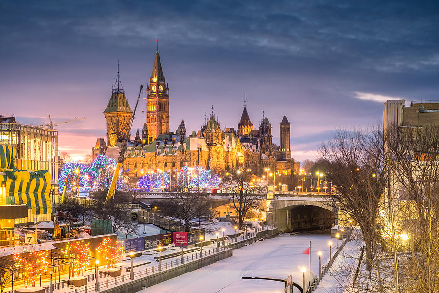 Parliament building shot from Rideau canal during sunset Photograph by Naibank