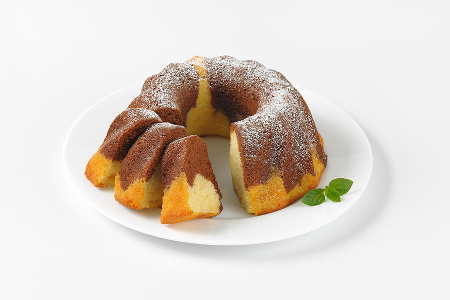 Partially Sliced Marble Bundt Cake Photograph by Vikif
