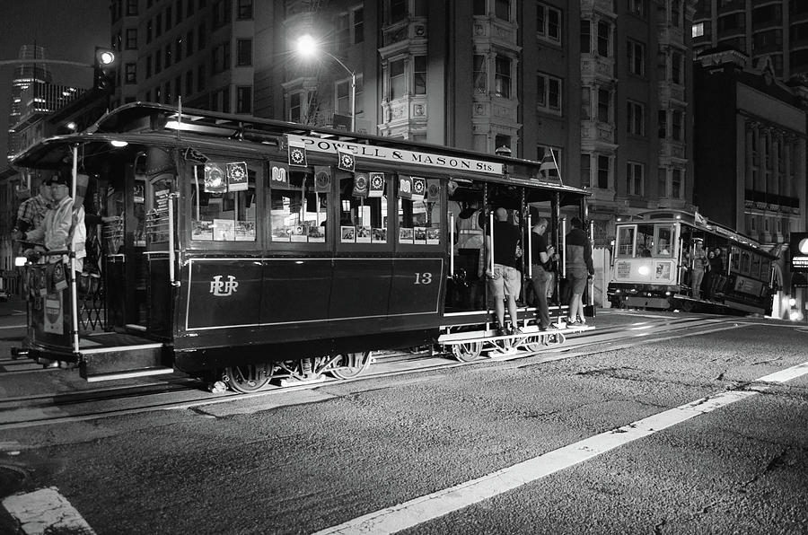 Passing Cable Cars at Night in San Francisco Black and White Photograph by Shawn OBrien
