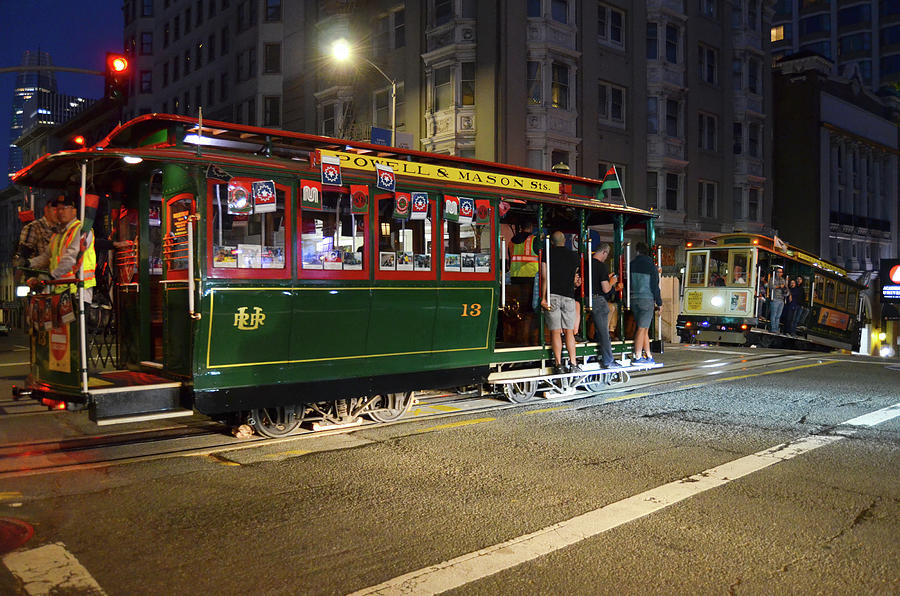 Passing Cable Cars at Night in San Francisco Photograph by Shawn OBrien