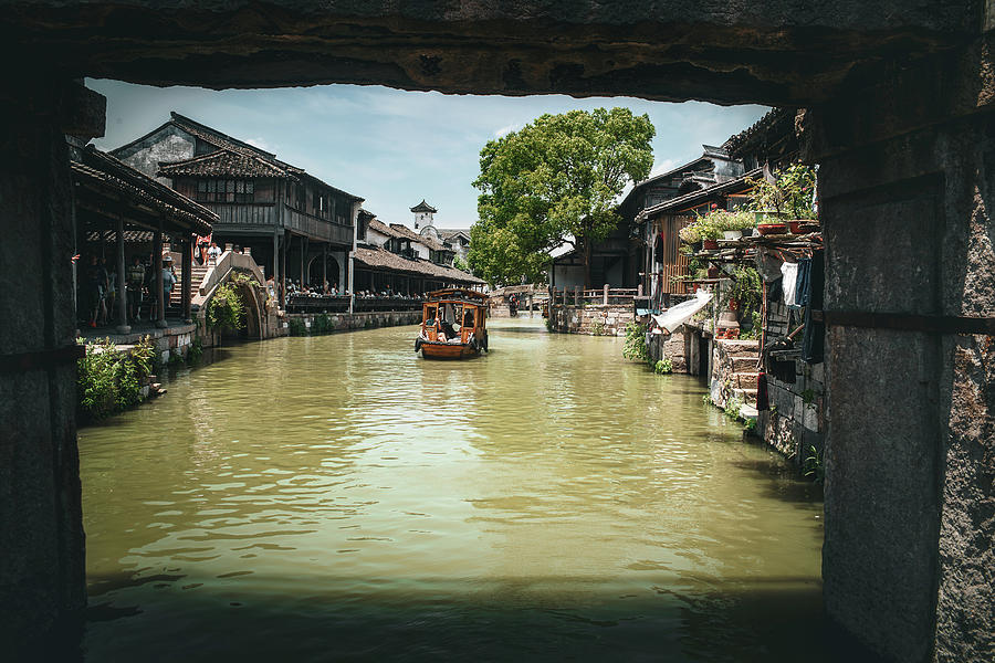 Passing Under the Stone Bridge in Wuzhen Photograph by Benoit Bruchez
