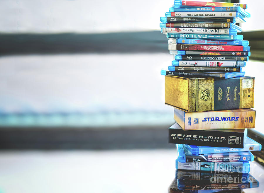 Passion for cinema, a stack of movie collection in blue ray disc Photograph by Luca Lorenzelli