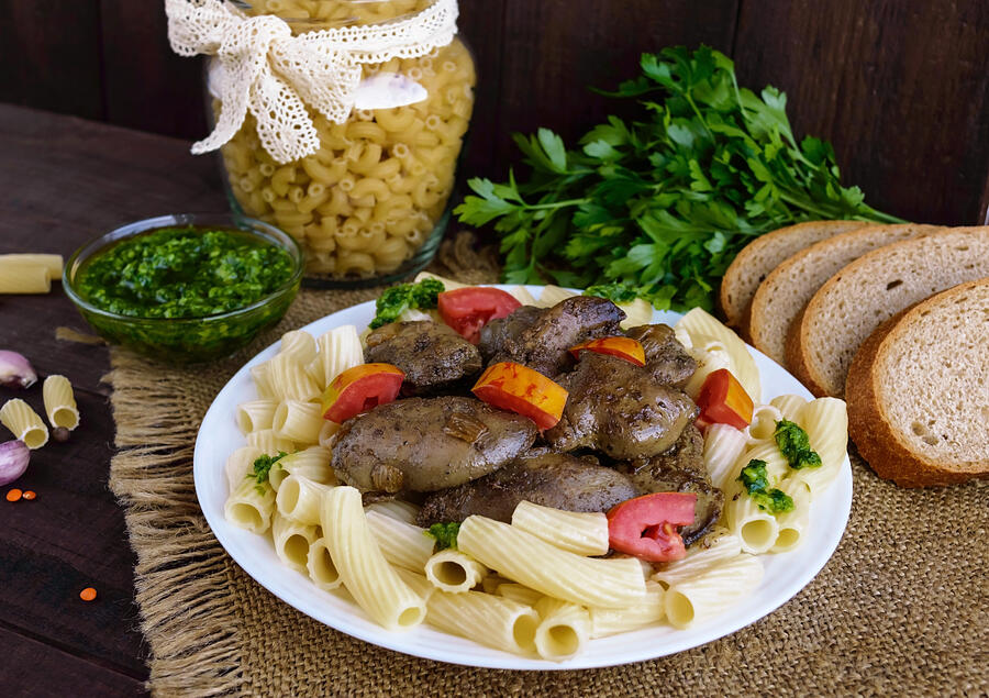 Pasta and fried goose liver (chicken, duck) Photograph by Maryna Iaroshenko