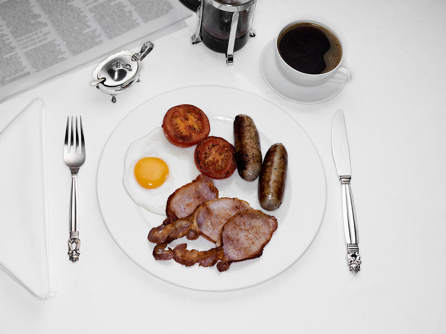 Pate of English Breakfast, coffee and newspaper Photograph by Jonathan Knowles