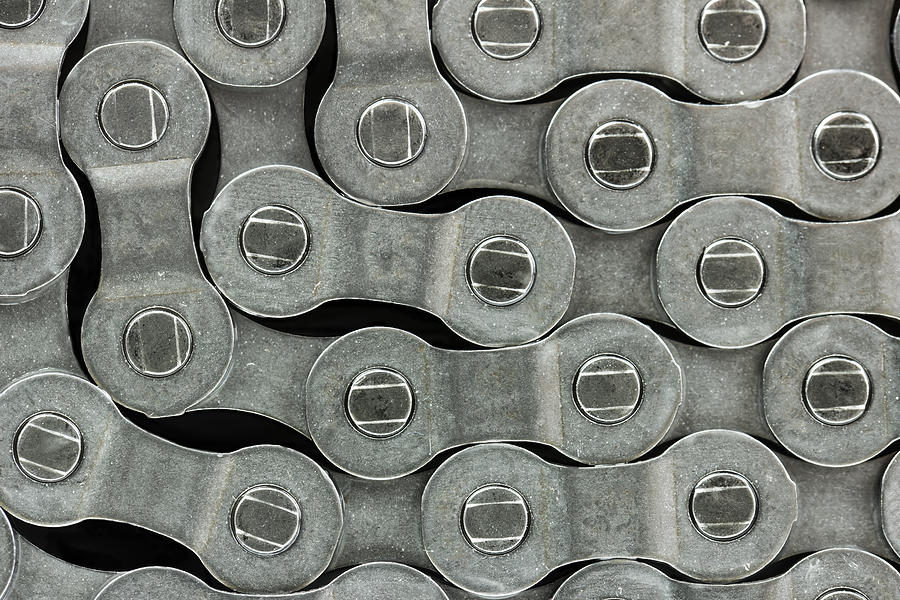 Pattern formed by the bicycle chain Photograph by Gregflat