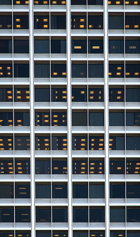 Pattern of lights in a Office Building Photograph by Thomas Winz