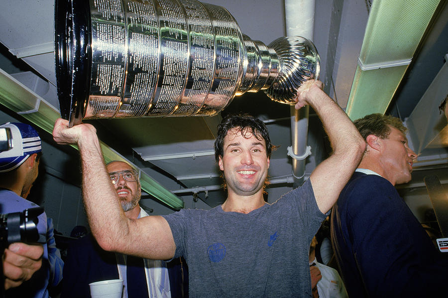 Paul Coffey Hoists The Stanley Cup Photograph by B Bennett
