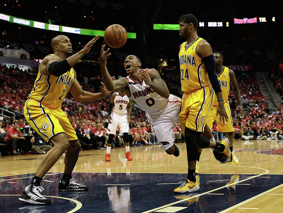 Paul George, Jeff Teague, and David West Photograph by Mike Zarrilli