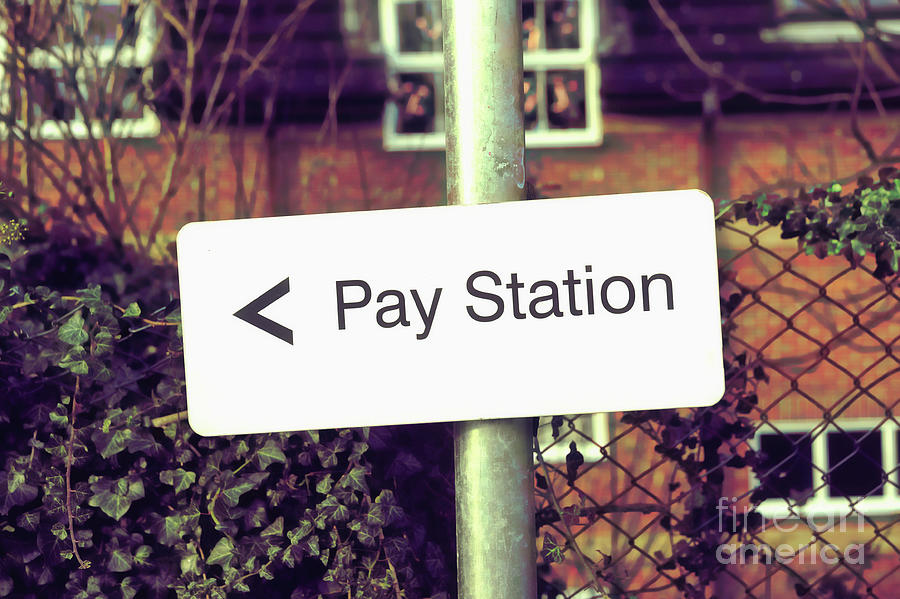 Pay station sign Photograph by Tom Gowanlock