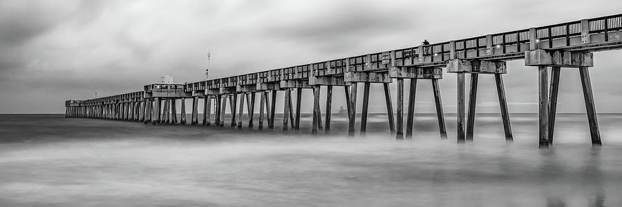 Black And White Photograph - PCB Russell Fields Pier Panorama - Black and White by Gregory Ballos