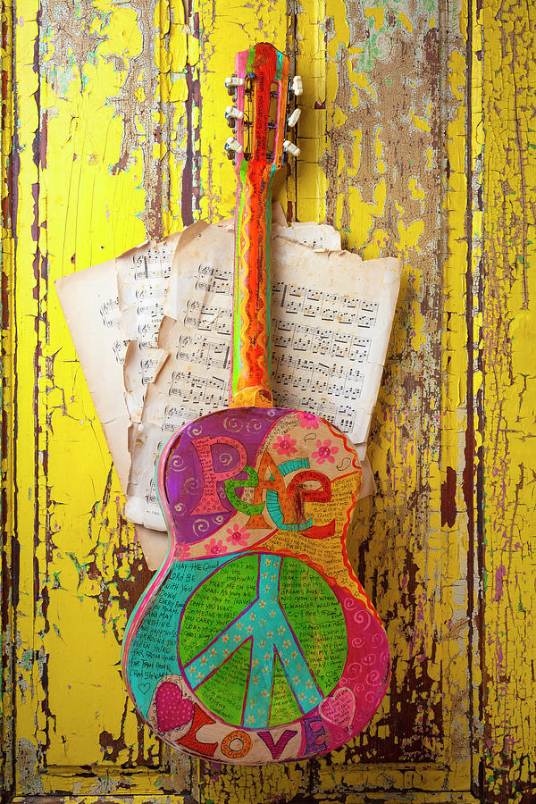 Music Photograph - Peace love Guitar Hanging On Old Yellow Door by Garry Gay